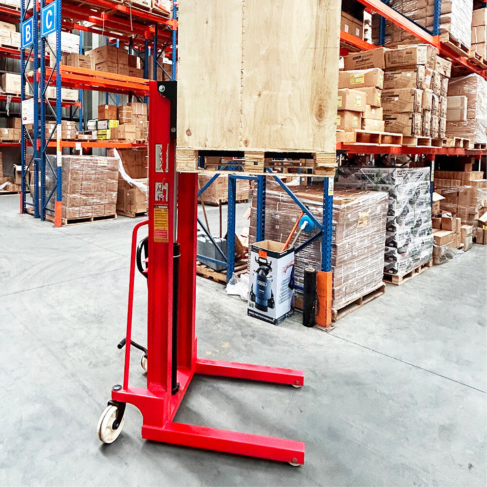 Manual hydraulic stacker lift truck, with 2m lift height and 500kg capacity. Ideal for material handling in warehouses and workshops, featuring durable red frame, compact design, and easy maneuverability