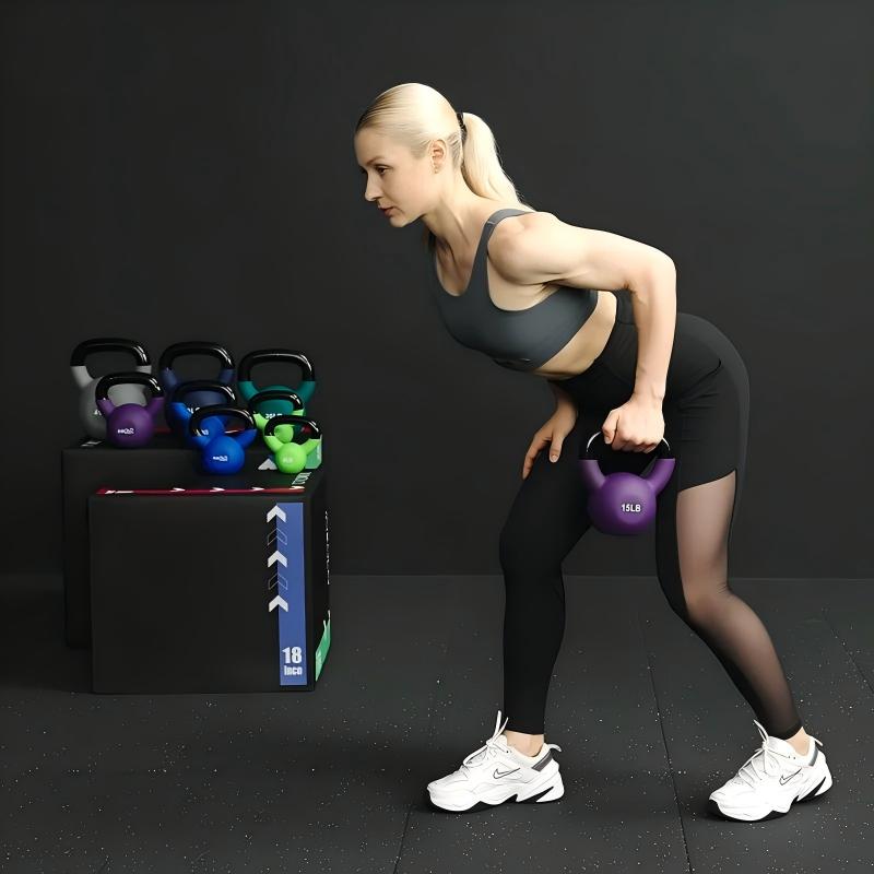 vinyl coated kettlebell weights in 5LB, 10LB and 15LB options with wide grip handles for home gym strength training, squats and full body workouts