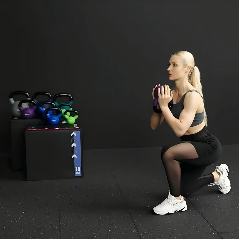 vinyl coated kettlebell weights in 5LB, 10LB and 15LB options with wide grip handles for home gym strength training, squats and full body workouts