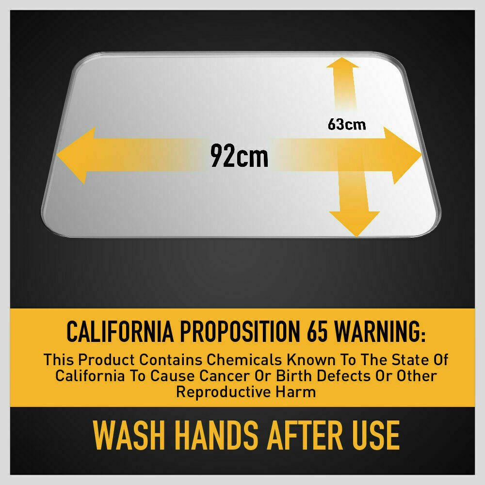Sturdy galvanized steel oil drip tray under a stored car.