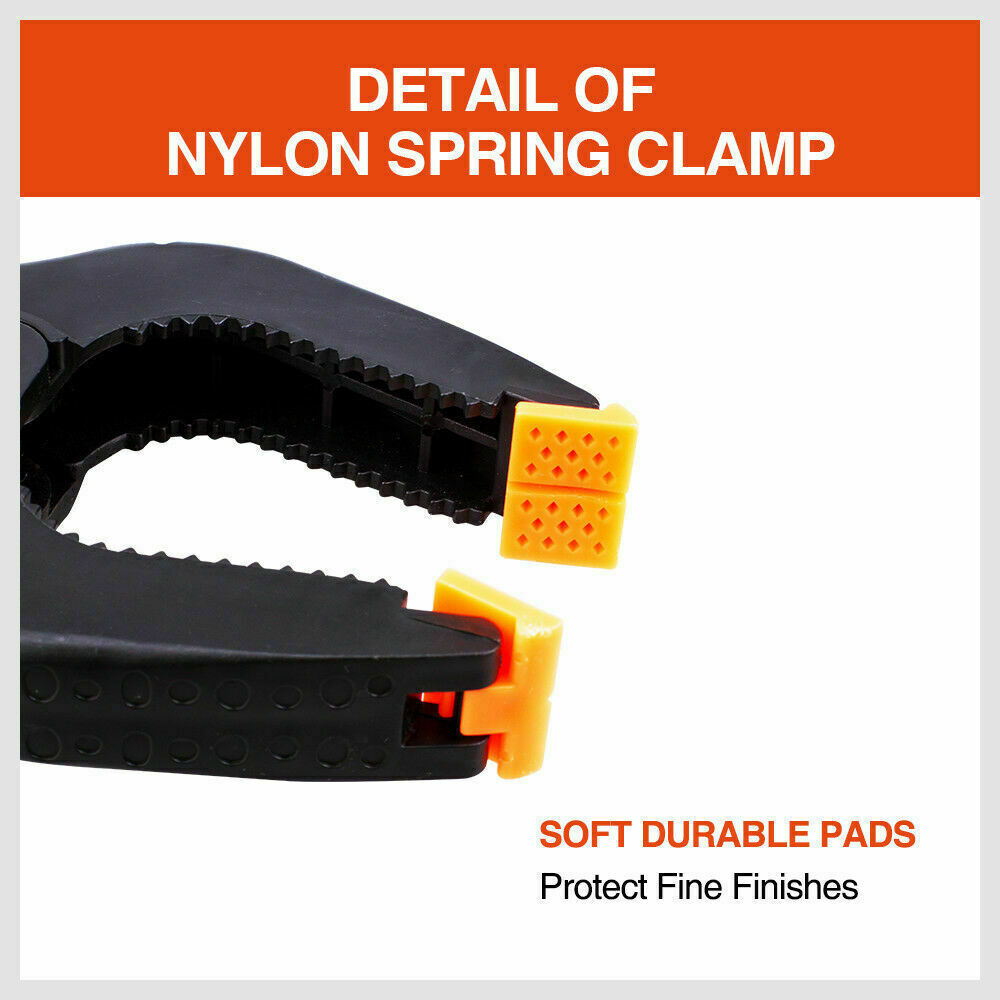 Four-piece set of 9-inch black heavy-duty nylon spring clamps, showcasing their strong, quick grip design and large size, suitable for a variety of clamping tasks