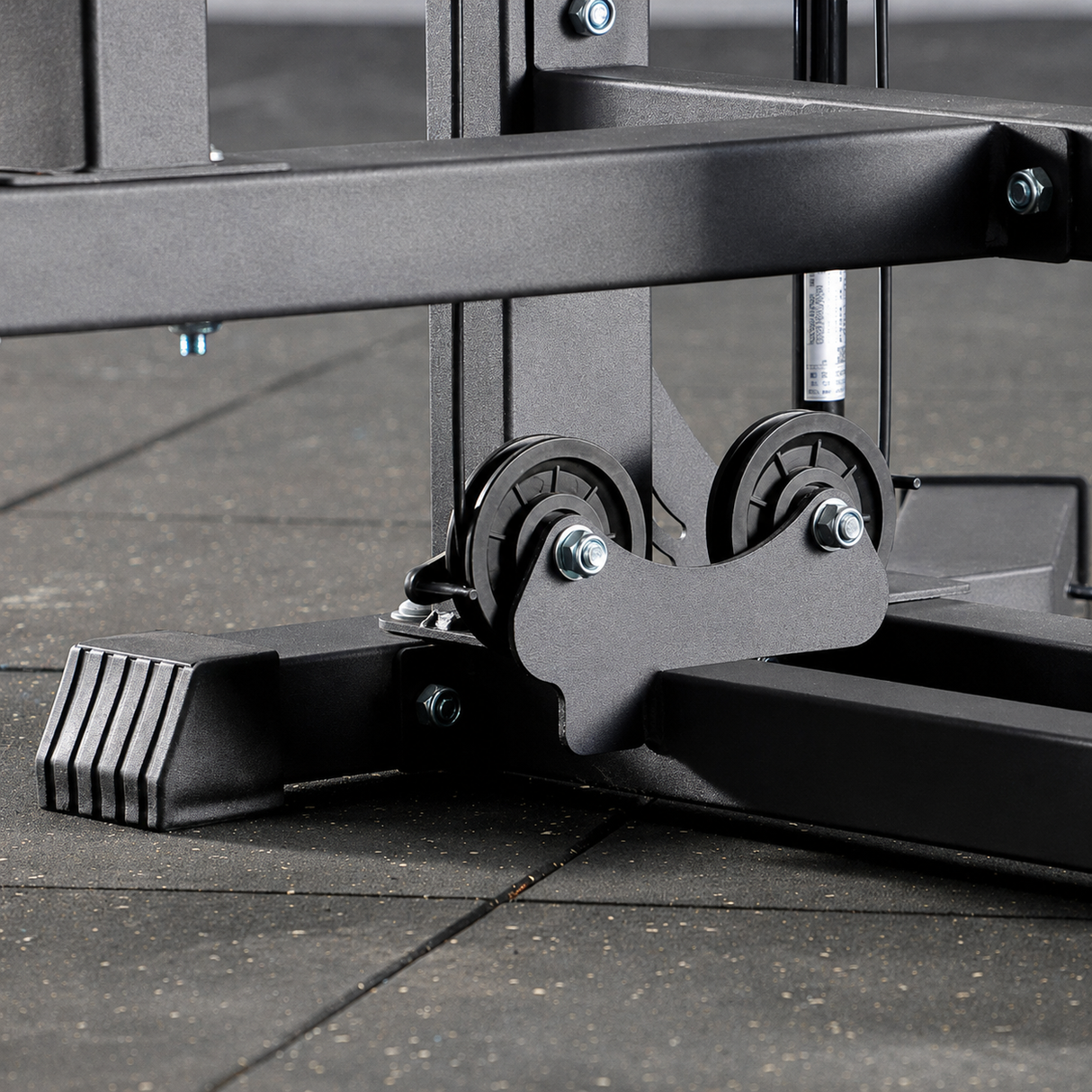 plate loaded lateral raise machine with adjustable arms, headrest, pulley system and steel frame for home gym shoulder training