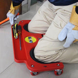 Rolling magnetic creeper seat with cushioned pads, tool organizer tray, and 360° swivel wheels for comfortable garage and workshop use.