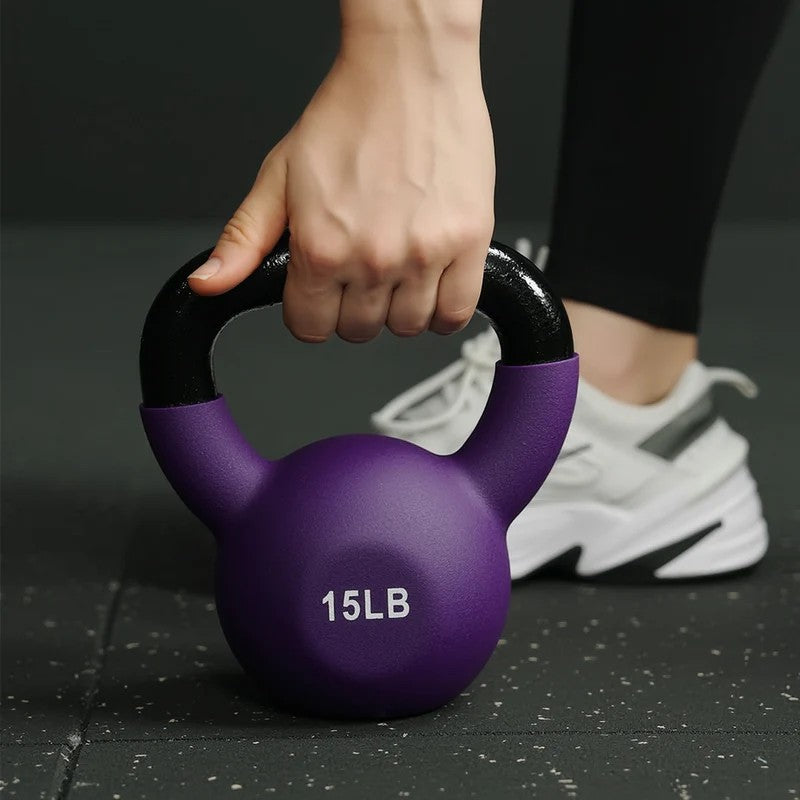 vinyl coated kettlebell weights in 5LB, 10LB and 15LB options with wide grip handles for home gym strength training, squats and full body workouts