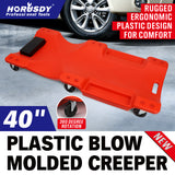 40-inch plastic mechanic creeper with padded headrest, tool trays and 360 degree swivel casters for automotive repair