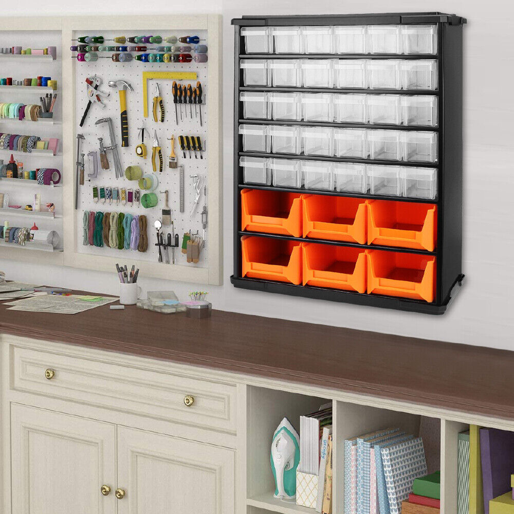 Wall mount 36 drawer parts organiser with clear and orange bins for screws, tools, and hardware storage