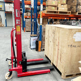  Manual hydraulic stacker lift truck with a 2000kg capacity and 1.6m lifting height, ideal for warehouse and industrial lifting tasks.