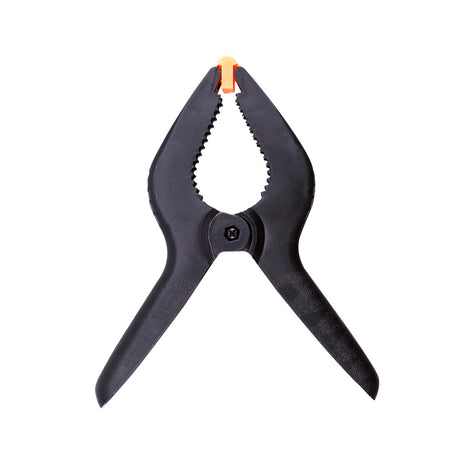 Four-piece set of 9-inch black heavy-duty nylon spring clamps, showcasing their strong, quick grip design and large size, suitable for a variety of clamping tasks