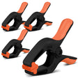 Pack of 4 HORUSDY 7-inch black nylon spring clamps with orange non-slip TPR handles and reinforced glass fiber construction for secure clamping.