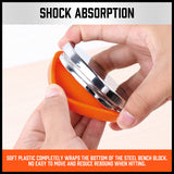 Round 3-inch steel bench block with mirror polish and soft base for jewelry stamping, including two punches.