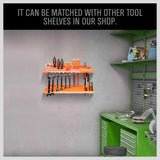  Wall-mounted tool storage rack with removable bins for organized and accessible tool keeping.