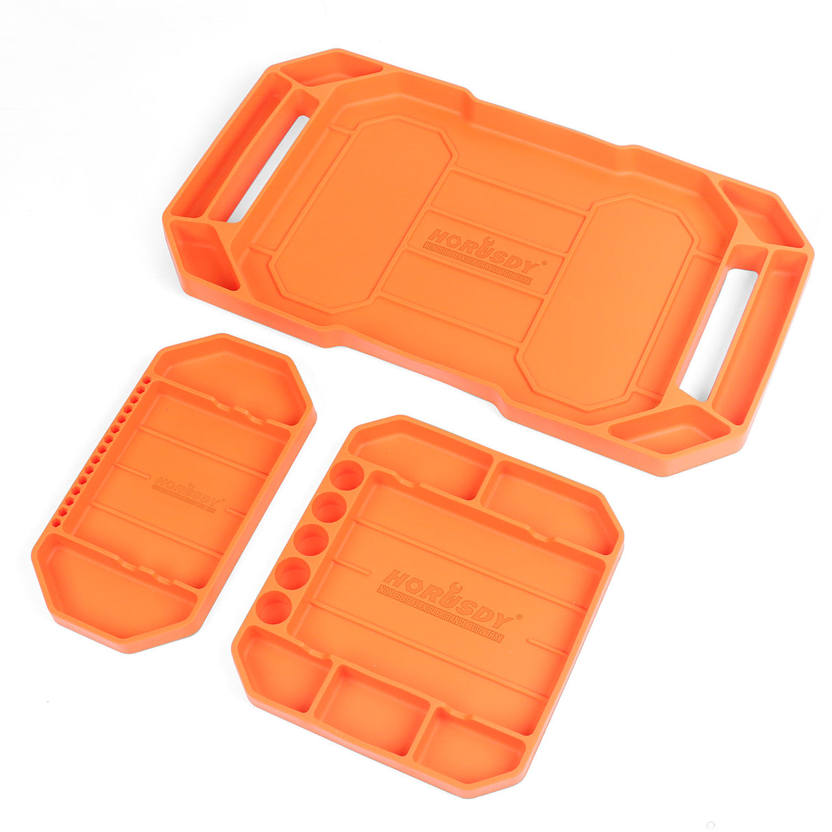Set of three non-slip, flexible silicone tool trays in different sizes for organizing parts and tools in a workshop.