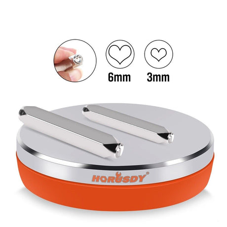 Round 3-inch steel bench block with mirror polish and soft base for jewelry stamping, including two punches.